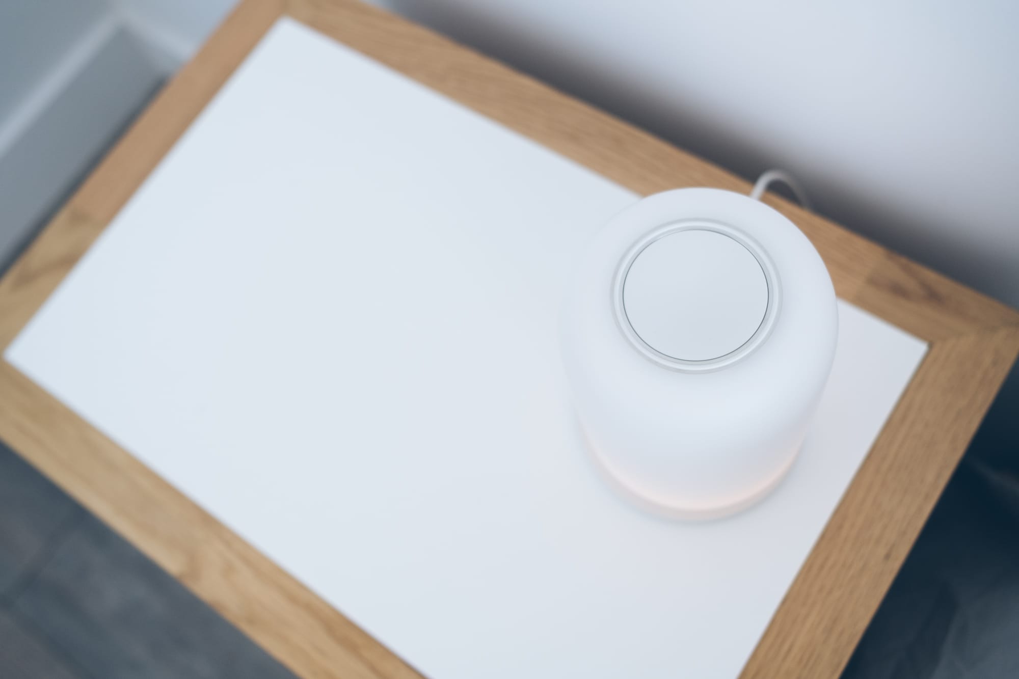 top viiew of lamp showcasing the big round button at the top