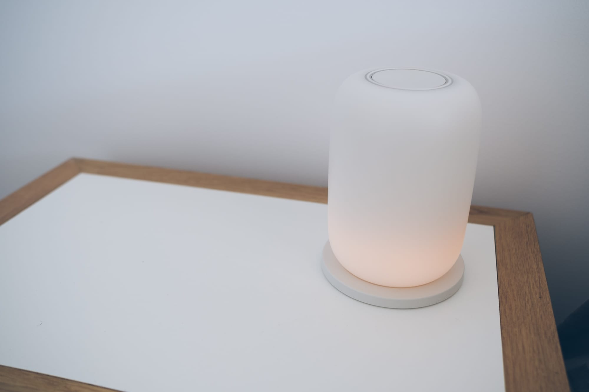 lamp on base with a slight glow coming from the bottom
