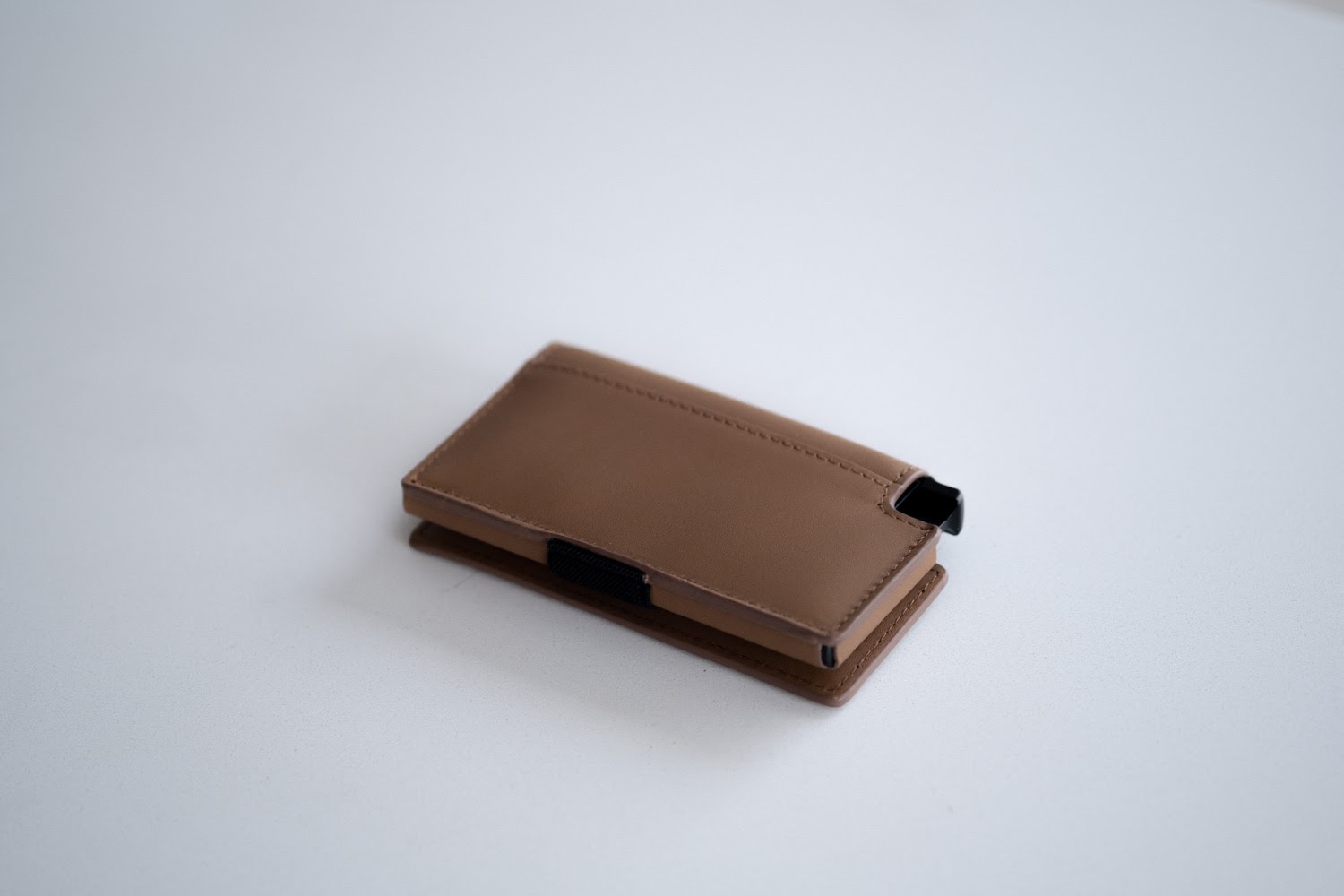 Ekster wallet flipped over showing backside
